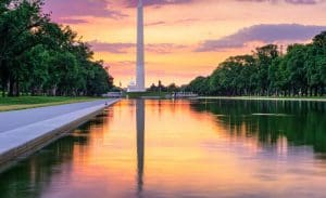 Washington DC and Monument Washington Monument and Capitol Building from the Reflecting Pool in Washingon DC, USA.